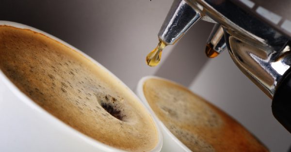 Coffee machine espresso. Process of preparation of coffee. A close up